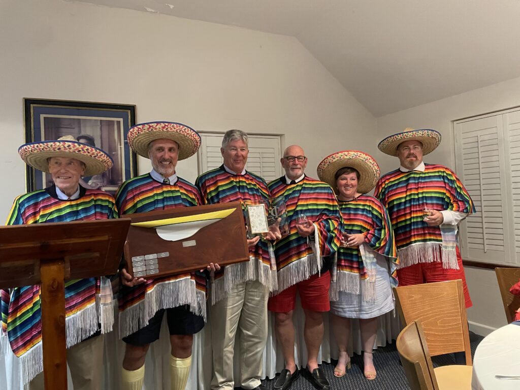 What better way to celebrate Cinco de Mayo than by winning Bermuda Race Week! (L-R) Rick Thompson Bermuda Fleet Captain, Martin Siese skipper, Patrick Cooper tactics and cooler operation, Bill McNiven jib and kite, Melinda Bessy foredeck, Andrew Butterworth main and reserve cooler man.
